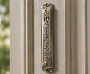 Mezuzah on a doorway for certified mezuzah inspection and kosher verification